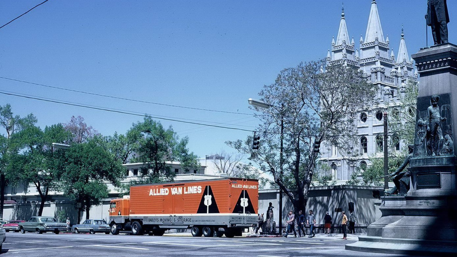 Vintage shot of Bailey's Allied truck outside a busy square.